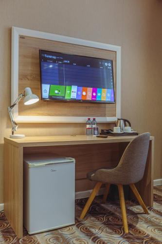 TV a/nebo společenská místnost v ubytování Metro City Hotel