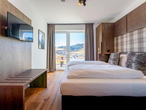 Posteľ alebo postele v izbe v ubytovaní Grebenzen Lodge 1028
