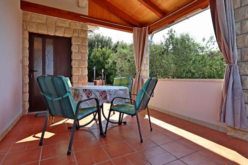 Apartments with parking space Barbat, Rab - 24215