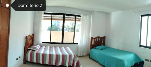 Postel nebo postele na pokoji v ubytování Amplio - Zona Premium