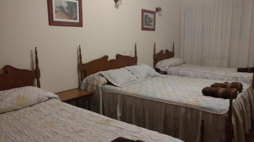 Postel nebo postele na pokoji v ubytování Hotel Holimasú