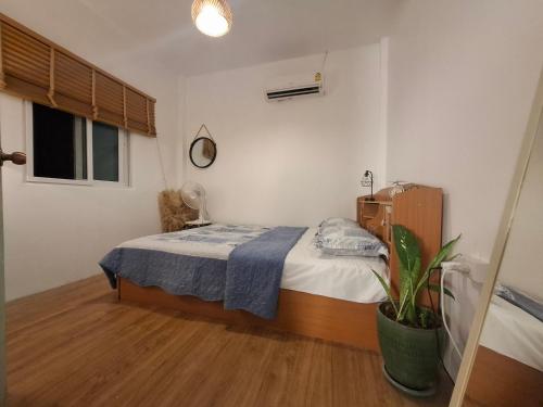 Ένα ή περισσότερα κρεβάτια σε δωμάτιο στο The Grove Guesthouse