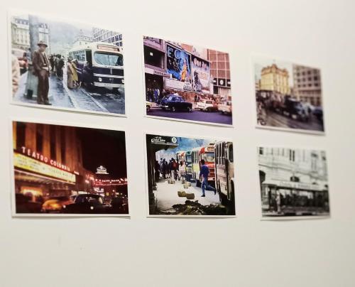 a group of pictures hanging on a wall at Cura Hostel Bistró in Villa Restrepo
