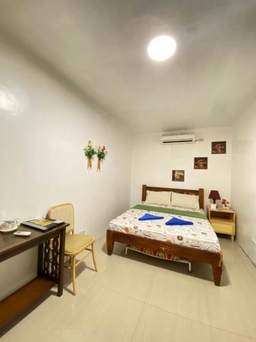Katil atau katil-katil dalam bilik di AlonaBeach Tourist Inn