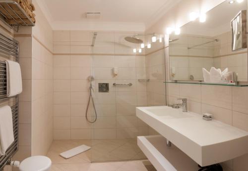 Koupelna v ubytování Boutique Hotel La Rocca