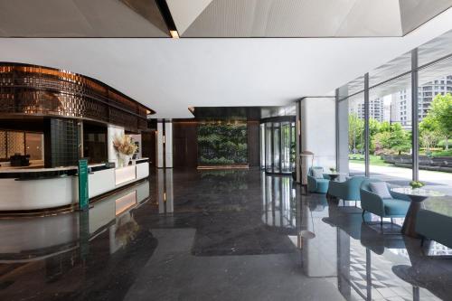 Χώρος καθιστικού στο Holiday Inn & Suites Shanghai Changfeng by IHG