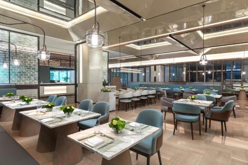 Εστιατόριο ή άλλο μέρος για φαγητό στο Holiday Inn & Suites Shanghai Changfeng by IHG