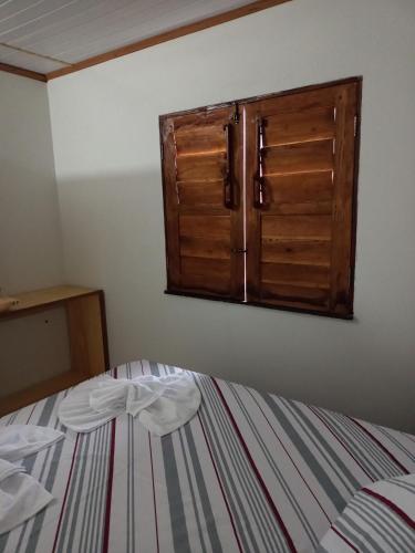 Postel nebo postele na pokoji v ubytování Casa pé do serrão