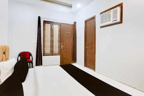 Super Hotel O Bareilly Near Satellite Bus Standにあるベッド