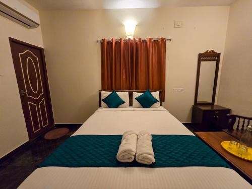 Una cama o camas en una habitación de Saverra Resort