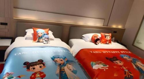 Zhangjiagang Guomao Hotelにあるベッド