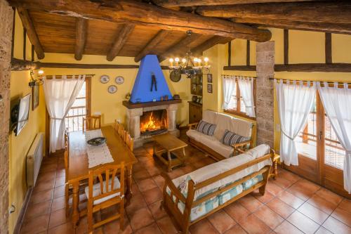an overhead view of a living room with a fireplace at Casa El Mirador in Beceite
