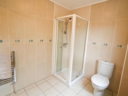 a bathroom with a shower and a toilet at Stob-Ban View - S4582 in Fort William