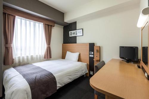 Televisyen dan/atau pusat hiburan di Comfort Hotel Tendo