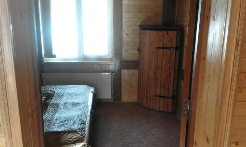 Postel nebo postele na pokoji v ubytování Cottage u Yaremy Mykulychyn
