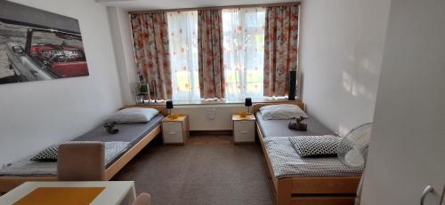 Ένα ή περισσότερα κρεβάτια σε δωμάτιο στο Apartman DAMJAN