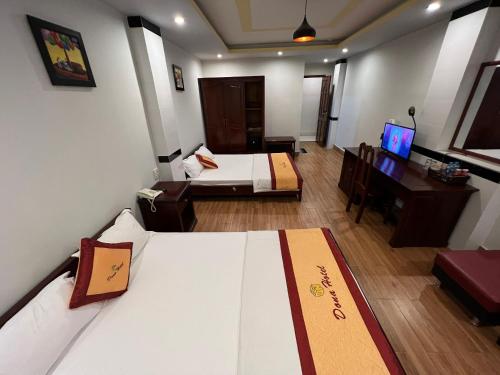 Postel nebo postele na pokoji v ubytování DONA hotel