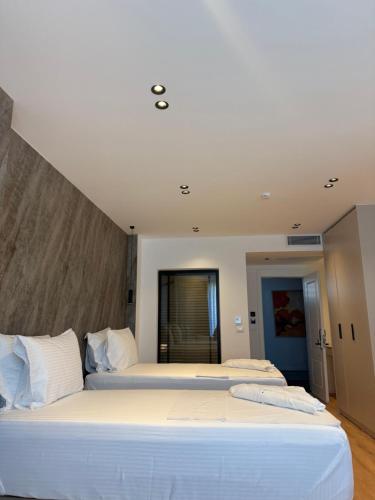 Una cama o camas en una habitación de Hotel Ari Gjakove