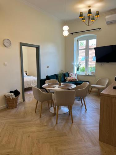 TV a/nebo společenská místnost v ubytování Apartament Frombork Łempicka