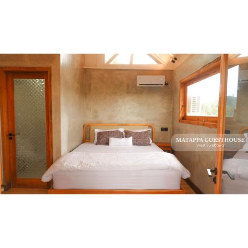 Postel nebo postele na pokoji v ubytování Matappa Guest House
