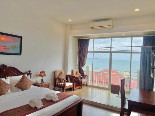 Katil atau katil-katil dalam bilik di Aristocrat Residence & Hotel