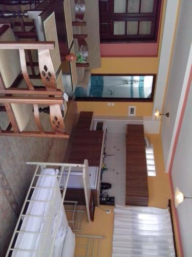 an overhead view of a staircase in a house at Green Hill Studios & Apartments in Kokkari