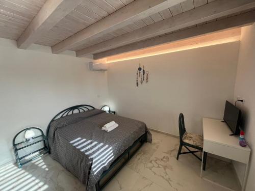 Ένα ή περισσότερα κρεβάτια σε δωμάτιο στο Ciane residence 3