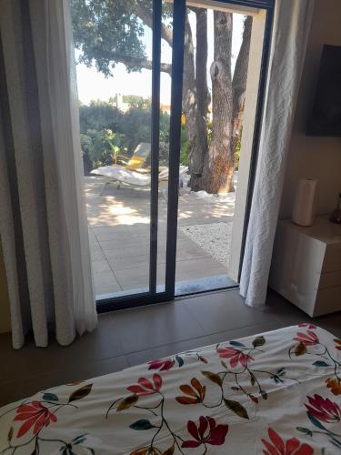 Ένα ή περισσότερα κρεβάτια σε δωμάτιο στο Villa Francine