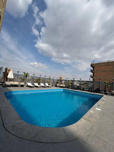 Πισίνα στο ή κοντά στο New Marwa Palace