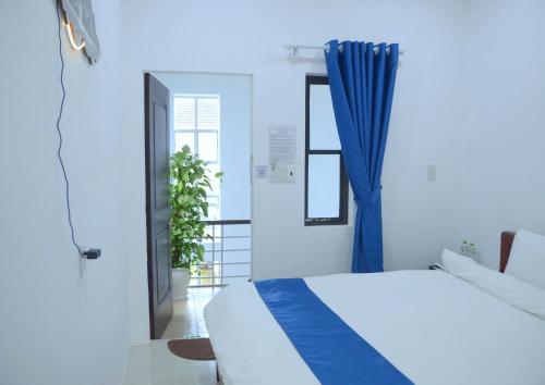 Ένα ή περισσότερα κρεβάτια σε δωμάτιο στο SHARE Hostel & Coffee