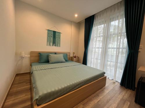 Postel nebo postele na pokoji v ubytování NS Home B5-301