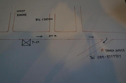 a whiteboard with a diagram of a plane at Tanyahouse in Chiang Rai