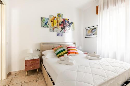 Katil atau katil-katil dalam bilik di Exclusive Apartament e Depandance - Vle Dante - Riccione - Privacy ed Enormi Spazi nel Quartiere più Rinomato