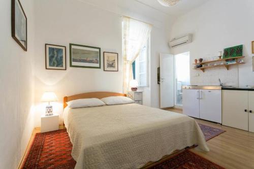 Posteľ alebo postele v izbe v ubytovaní Old Town Port Apartments