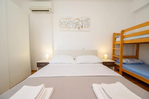 Ένα ή περισσότερα κρεβάτια σε δωμάτιο στο Apartments Deak