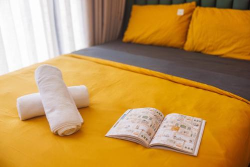 Postel nebo postele na pokoji v ubytování Vừng Hotel
