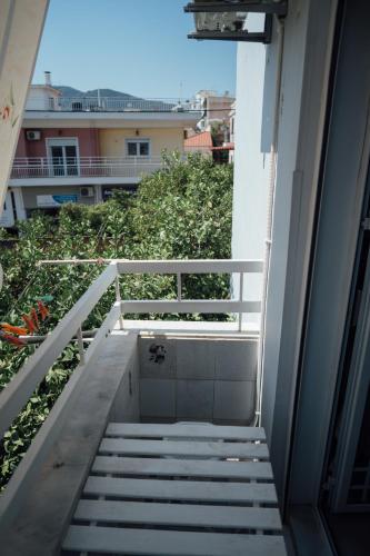 a view of a stairway from a balcony at Spacious Apartment in Mytilene in Mytilini
