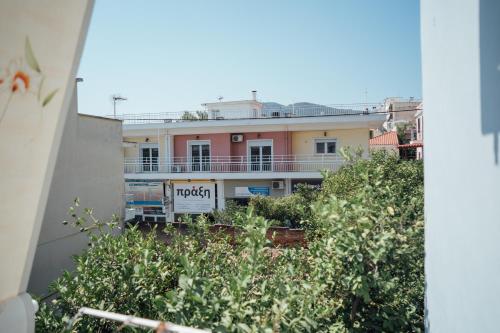 a view of a building with a balcony at Spacious Apartment in Mytilene in Mytilini