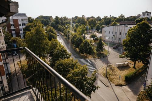 a view of a city street from a balcony at Apartment Drincic II in Brčko