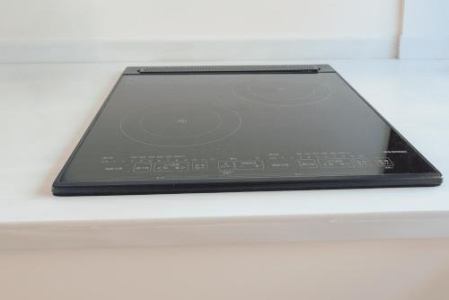 a tablet computer sitting on top of a counter at つるのこ縁屋 in Nanyo