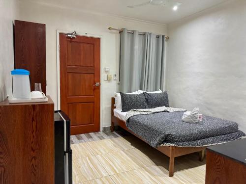 Postel nebo postele na pokoji v ubytování Motel Ever Rest
