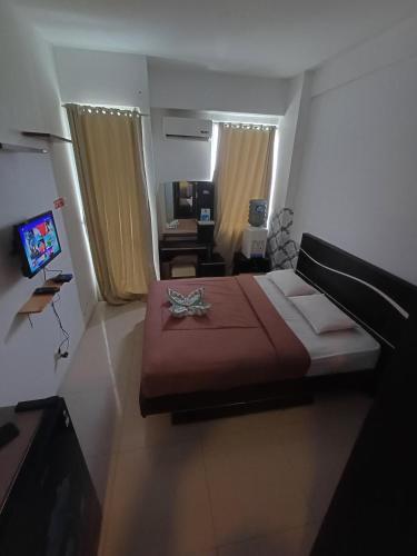 Televisyen dan/atau pusat hiburan di Vivo Apartement by Wm Management