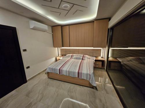 Postel nebo postele na pokoji v ubytování Sorjat Al Tal Chalet