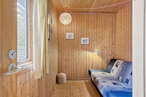 a room with a couch in a room with a window at 3037-Stege-Forgarden-24 in Stege