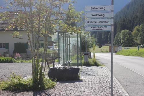 a street sign on the side of a road at Residence Salzgeber in Schruns-Tschagguns