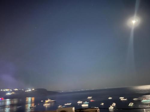 a street light over a harbor at night at Sulaj Sea view 2 in Himare