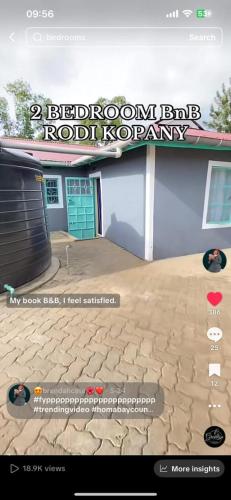 a screenshot of a house with a sign on it at 3 Bedroom Fine Executive Homes, Rodi KOPANY HOMABAY in Homa Bay