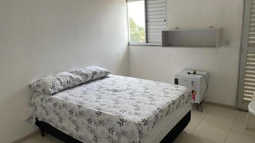 Ένα ή περισσότερα κρεβάτια σε δωμάτιο στο Pousada Recanto Bella Vista
