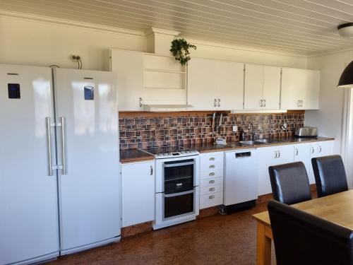 Kuchyň nebo kuchyňský kout v ubytování Villa Eni