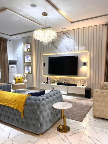 TV a/nebo společenská místnost v ubytování Luxury Duplex
